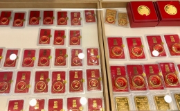 Gi&aacute; v&agrave;ng miếng SJC v&agrave; v&agrave;ng nhẫn c&ugrave;ng tăng vọt, l&ecirc;n cao nhất lịch sử