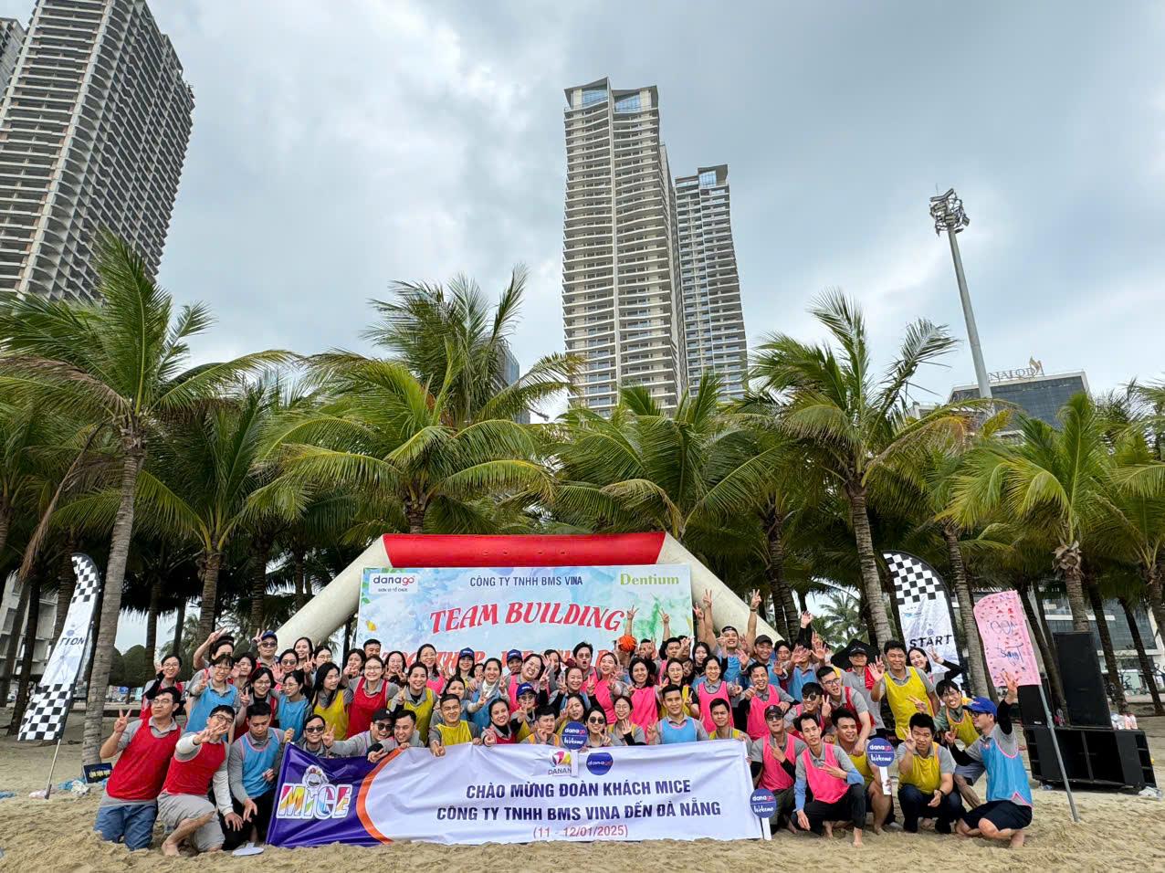 A group of people posing for a photo 
Description automatically generated